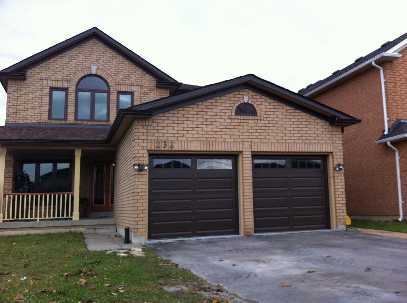 Dark brown soffit, fascia, eavestrough  